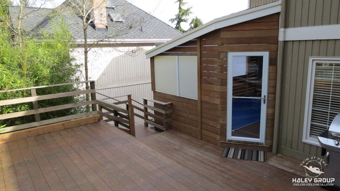Enclosure entry door off the hardwood deck