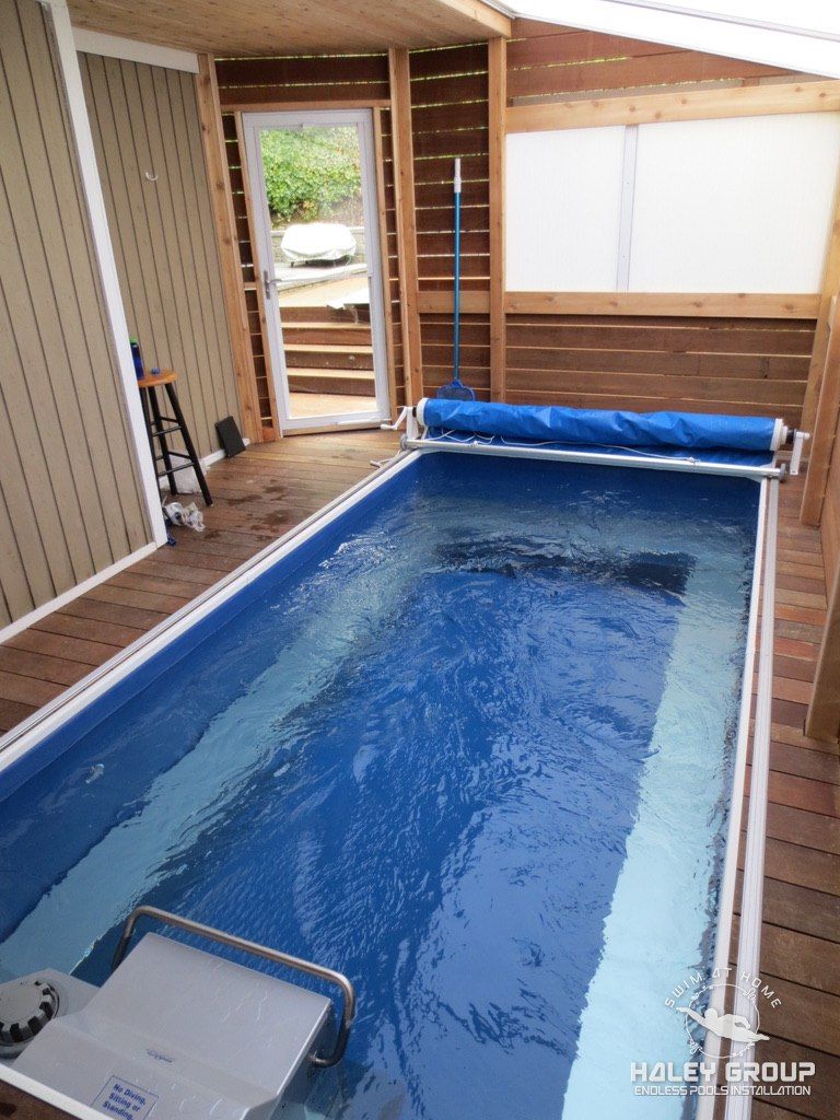 Interior: Endless Pool with roller cover, hardwood deck and IPE (ironwood) walls